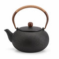 Tetera de hierro fundido 1.20 L negra con asa de cuerda estilo tradicional